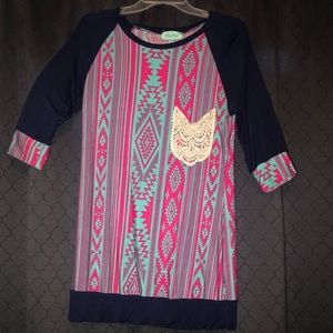 A pink and blue shirt.